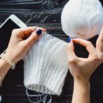 compressed girl knits cafe
