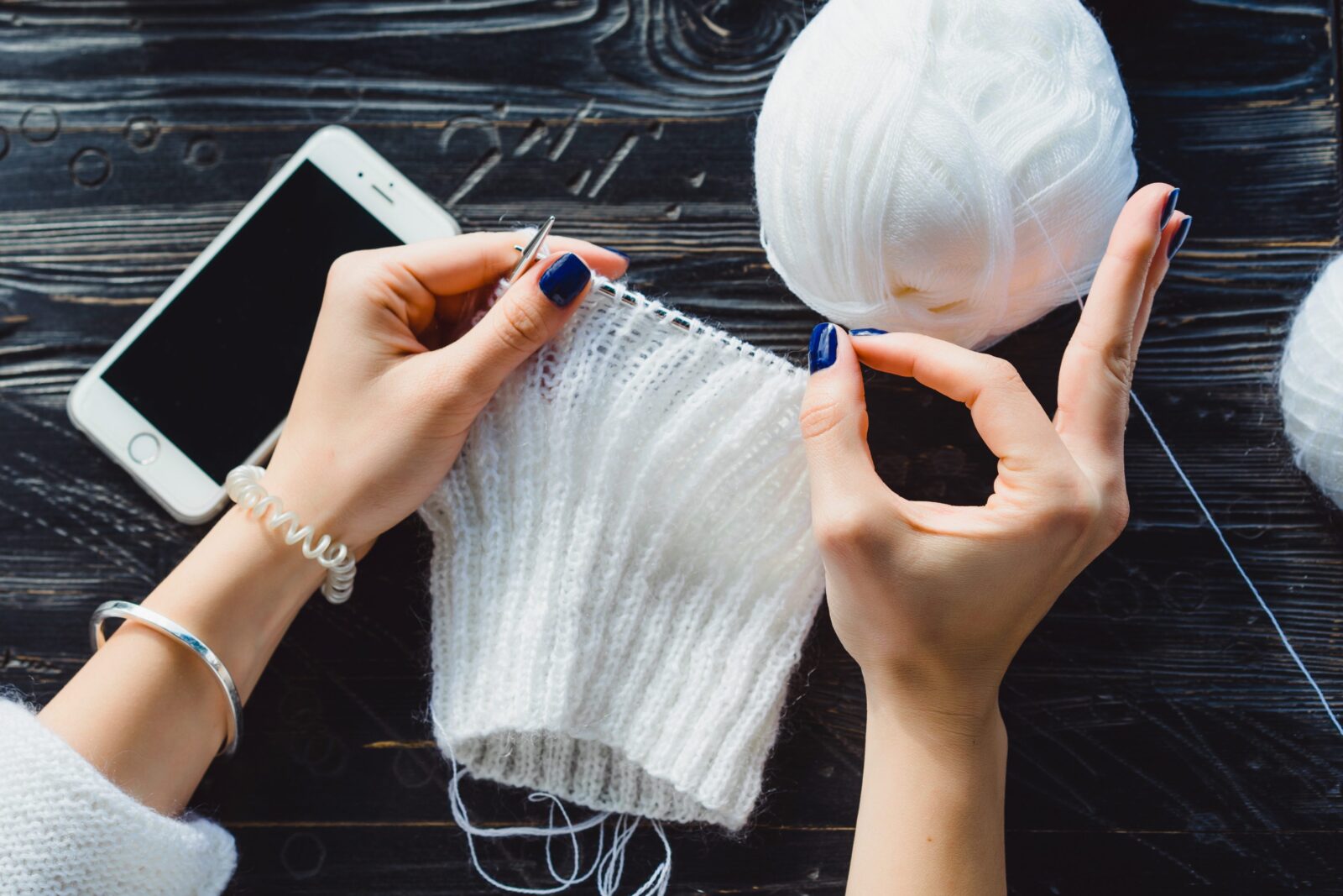 compressed girl knits cafe