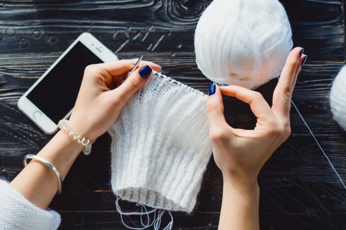 compressed girl knits cafe